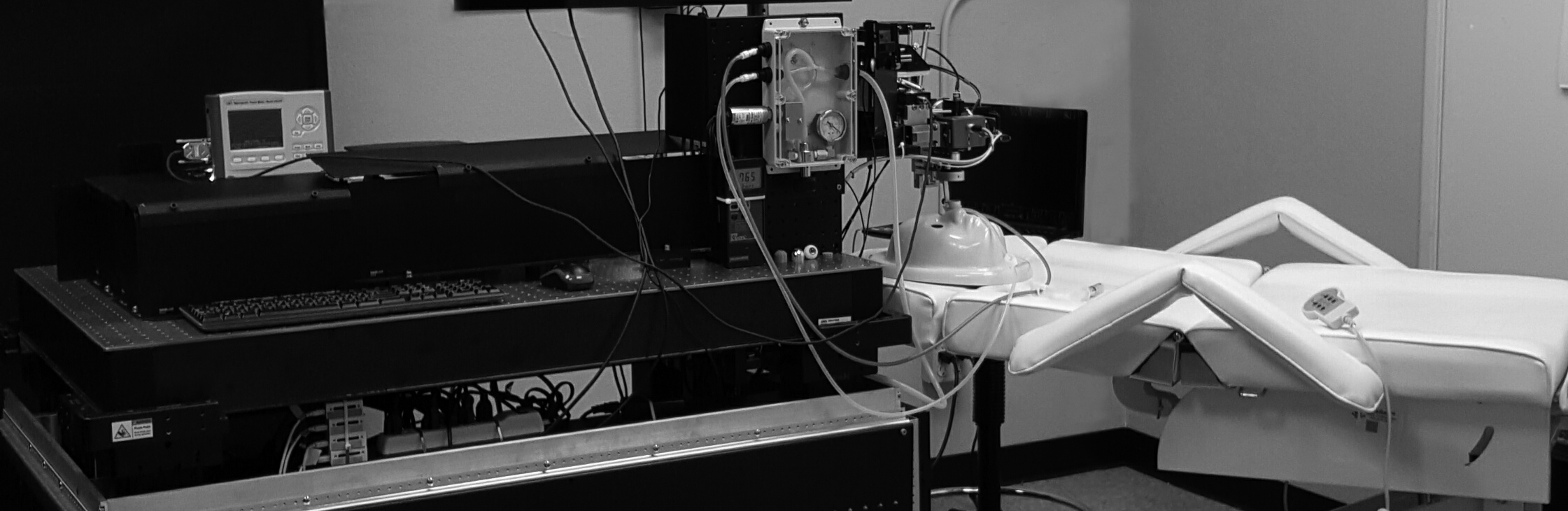 The perfect lens prototype is displayed, the left side shows the system and the right side a patient bed.